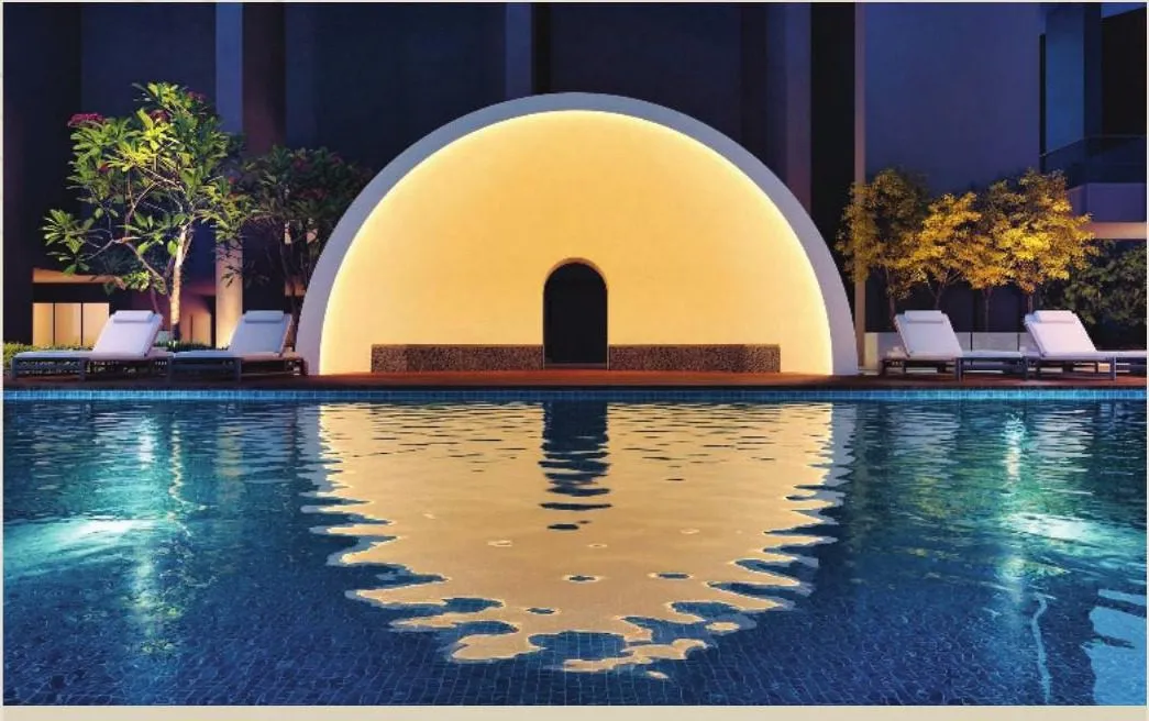 Moonlight Pavilion reflected in the pool at night